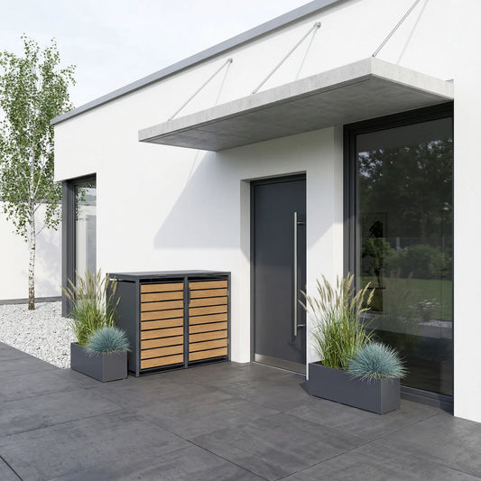 2er Mülltonnenbox Holzoptik neben Haustür – modernes Haus mit Seilabspannung und Ziergräsern