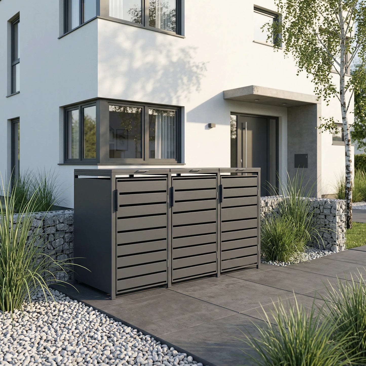 3er Mülltonnenbox anthrazit vor modernem Haus – Gabionenmauer mit Birke und Kiesbeet